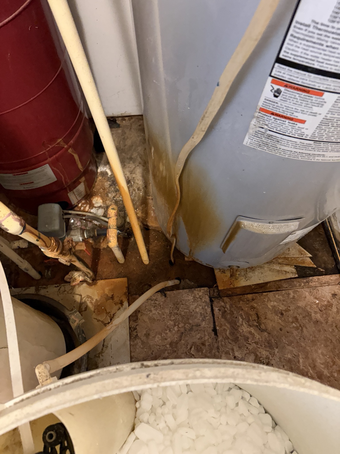 Water damage around the utility equipment before removal